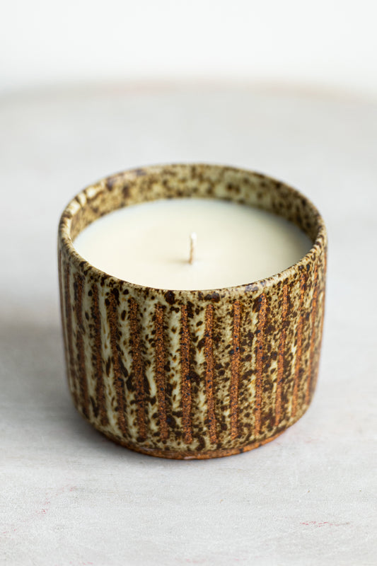 beige freckled glory stoneware candle