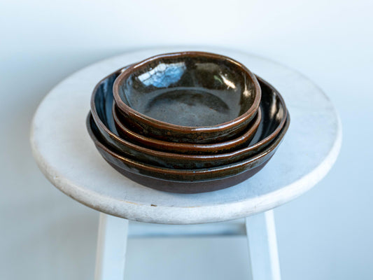 pairs of underdog stoneware celadon bowls